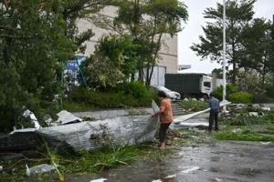 ‘Everything broken’: Chinese residents in typhoon path assess damage