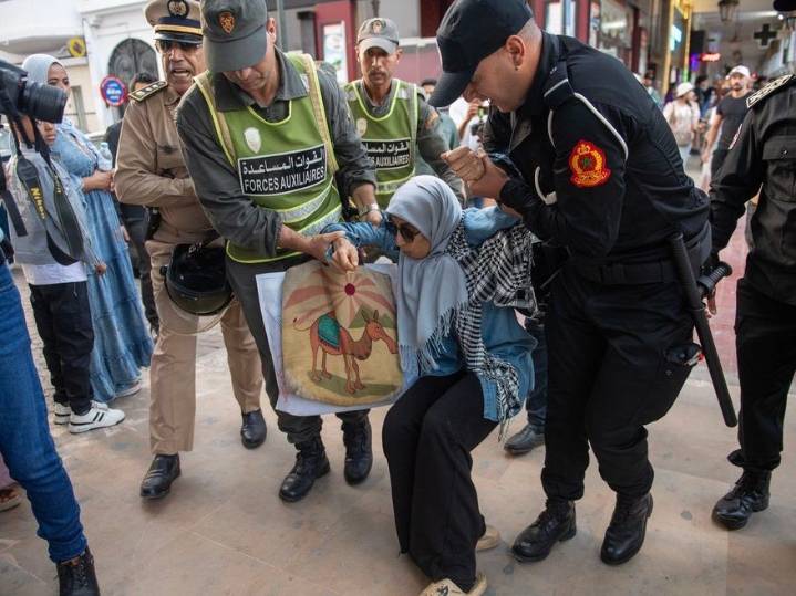 Young Moroccans clash with police while protesting