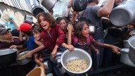 Denying famine, Israel threatens more curbs on Gaza aid