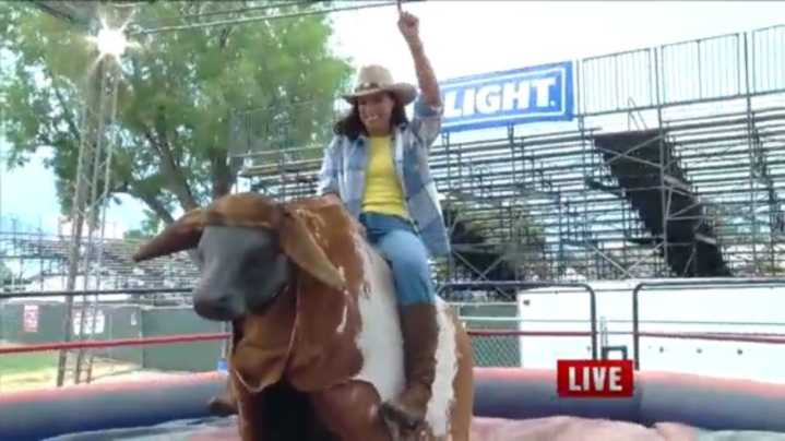 At the Fair: Candy Caceres tests a bucking mechanical bull