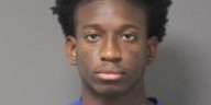 Man arrested for reckless driving and racing following crash on I