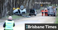 Driver charged after two men die in rollover