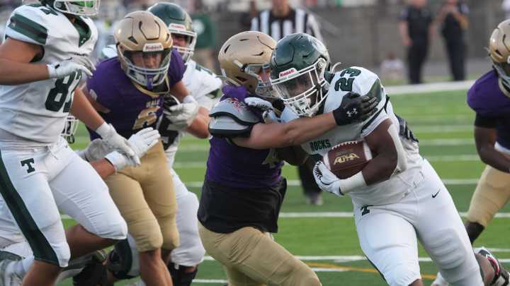 Trinity football, behind balanced attack, spoils Male's first game on new field