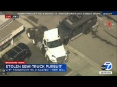 SWAT vehicle slams into semi-truck during chase
