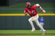 Deadspin | Reds use trio of homers to go one back of Mets, erase Cubs