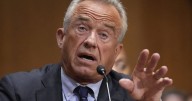Kennedy tries to defend COVID-19 vaccine stance in raucous Senate hearing