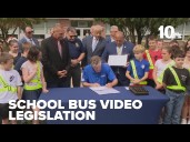 Ceremonial signing for school bus video system legislation