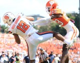 Syracuse crushes Clemson behind gutsy onside kick but may have lost its leader, Steve Angeli, in the process