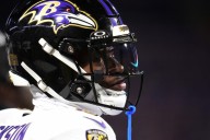 Ravens QB Lamar Jackson shoves Bills fan after being hit
