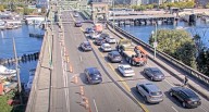 Suspect in stolen vehicle jumps gap on Seattle bridge, evades police (VIDEO)