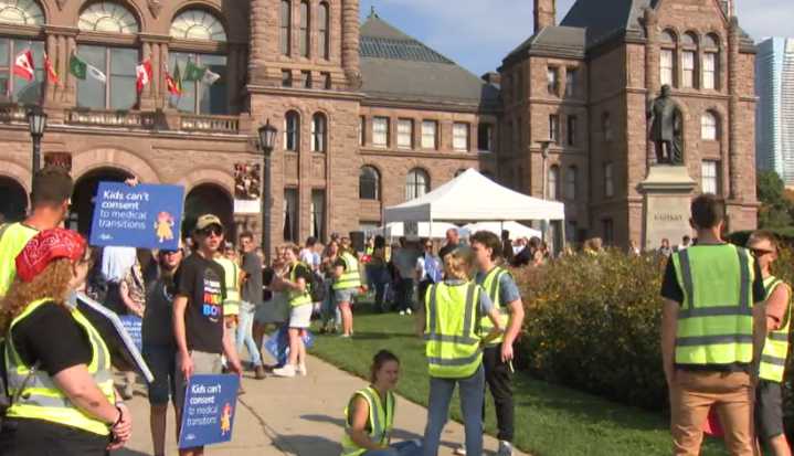 Duelling protesters feud over gender-affirming care for transgender youth at Queen’s Park