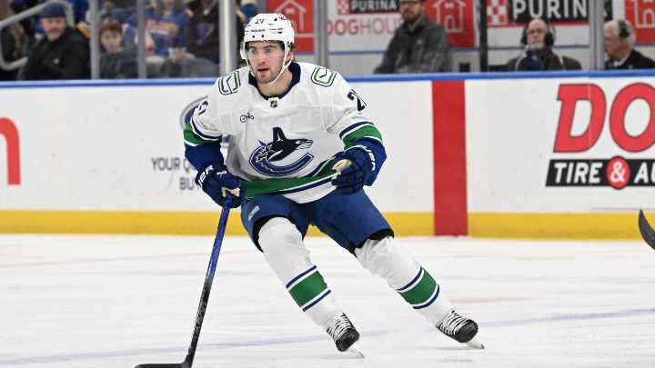 Canucks’ Nils Hoglander exits pre-season game vs. Flames with lower