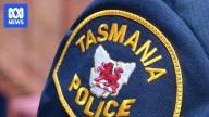 Police launch investigation after woman's body found in Hobart Rivulet by passer