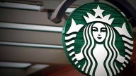 Starbucks to close stores, cut 900 jobs in $1 billion overhaul, CEO says