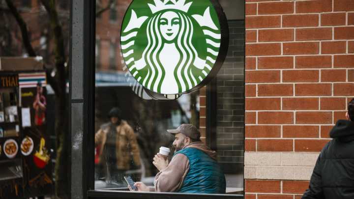 Starbucks to close hundreds of stores, lay off 900 workers as part of turnaround plan