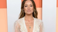 Olivia Wilde spotted kissing Ellie Goulding's ex husband outside restaurant before pair seen leaving together in taxi