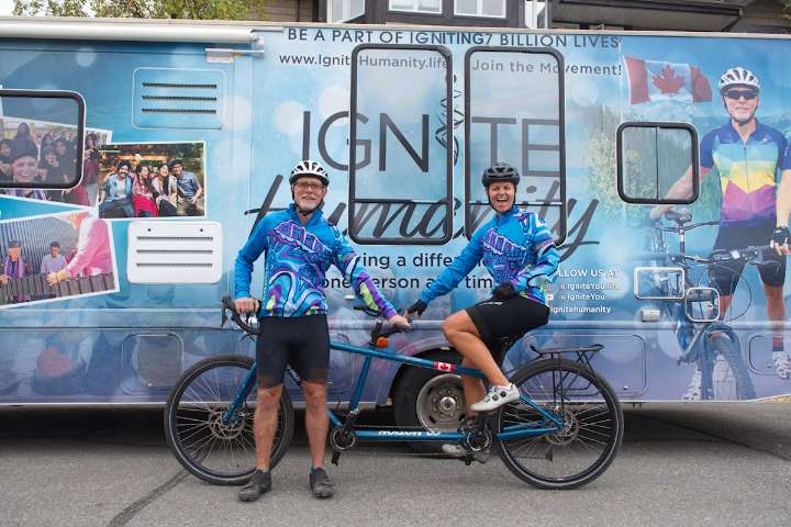 Tandem cyclists reach Yukon on 9,100-kilometre ride to fund classrooms