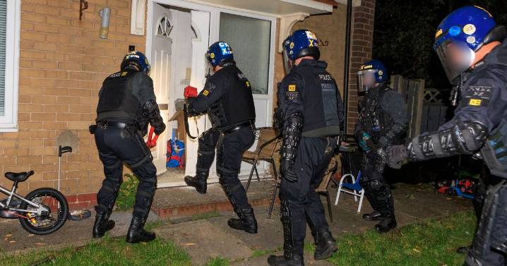 Three doors were bashed in, six people left in handcuffs