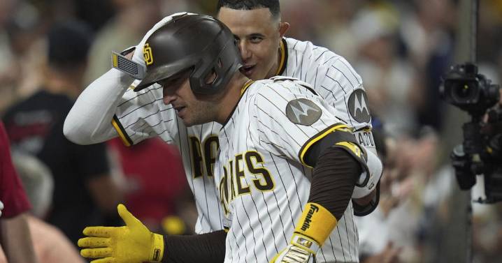 Padres clinch playoff berth with 11th-inning win over Brewers