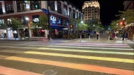 Volunteers create rainbow chalk art for Boise Pride