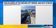Man injured after driving off bridge and into stream