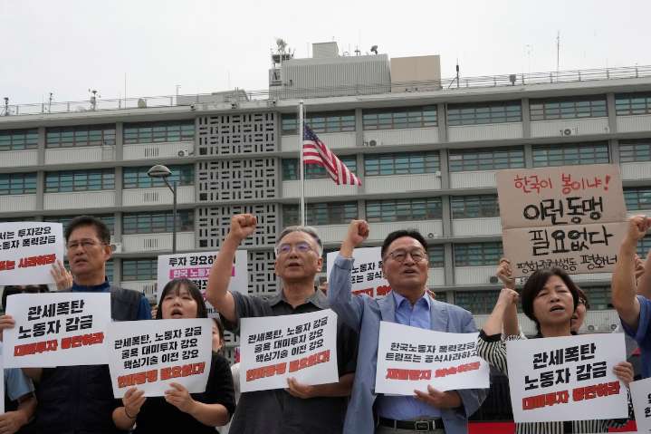 As plans are made to send detained Korean workers home, fear lingers for residents
