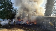 Firefighters tackle 2-alarm fire in SeaTac