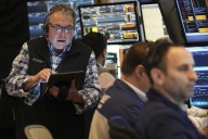Wall Street ticks higher with hopes for coming cuts to interest rates