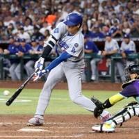 Ohtani bashes 54th homer of season as Dodgers clinch NL West title
