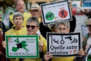 Right-to-die activists on trial in France as lawmakers debate end