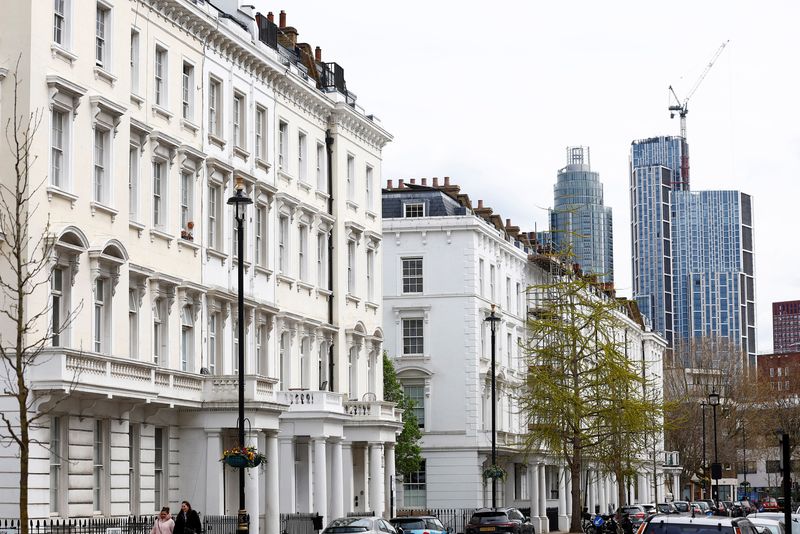 UK house prices fall while rents rise by least in 4 years, surveys show