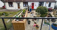 Woman ordered to get planning permission for plant pot after neighbour complains