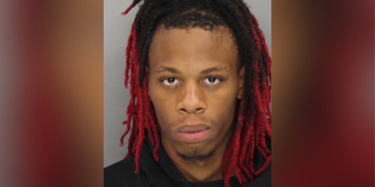 9-month-old girl shot, killed outside motel; suspect arrested