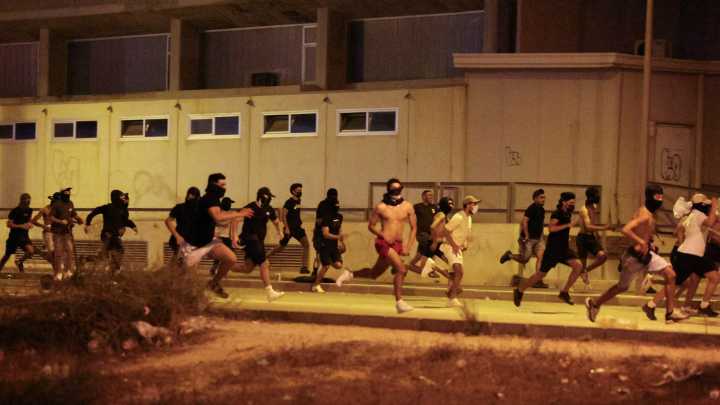 Hooded men attack migrants near asylum centre in Spain after 14-year-old girl raped as tensions rage across Europe