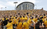 College football traditions: ‘Hawkeye Wave’ bonds everyone in stadium with kids in adjacent hospital