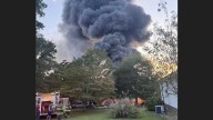 Large junkyard fire in Blountsville burns up to 200 vehicles