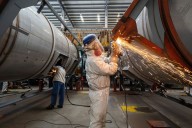 China's factory activity grows at fastest pace since March, private PMI shows
