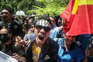 East Timor to scrap MP pensions and SUVs after protests