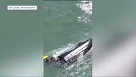 Lifeguard rescues elderly man who was tossed overboard by large waves in Palm Beach 
