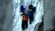 Video shows rescue of snowboarder who feel 100 feet from glacier
