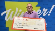 Two Arkansans claim big lottery prizes on the same day
