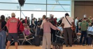 Passengers report delays Friday afternoon at Kansas City International Airport