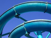 Woman's cruise ship waterslide ride ends awkwardly above the ocean