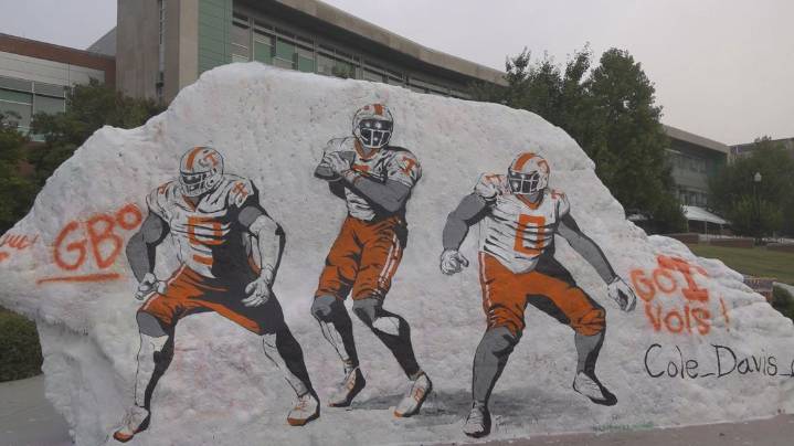 UT sophomore Cole Davis paints 'The Rock'