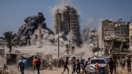 Israel strikes high-rise building and threatens to hit more in Gaza City offensive