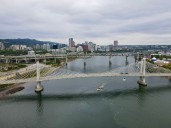 Who might see thunderstorms on Tuesday around Portland?