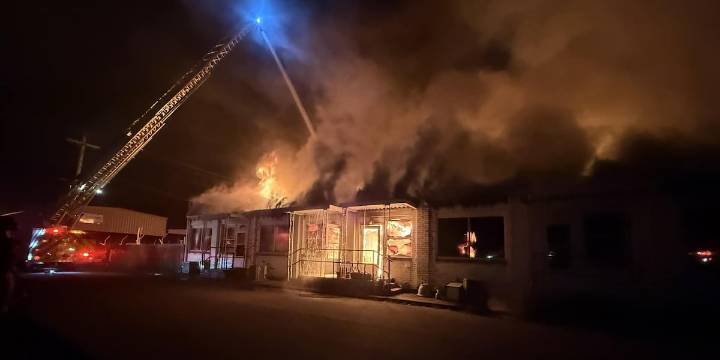 Scottsburg firefighters battling apartment fire across the street from fire station