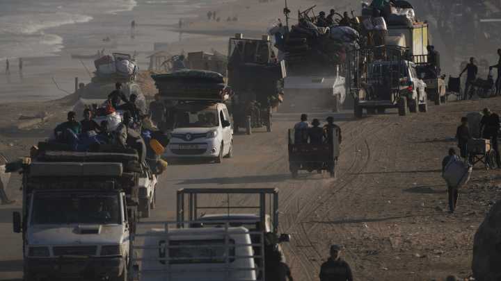 Israeli troops press forward into Gaza City as Palestinians flee