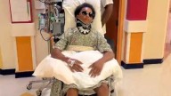 Teen paralyzed in first high school football game shows courage: 'Keep praying because it's working'