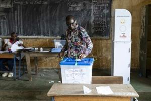 Guineans approve new constitution by wide margin, pave way for elections